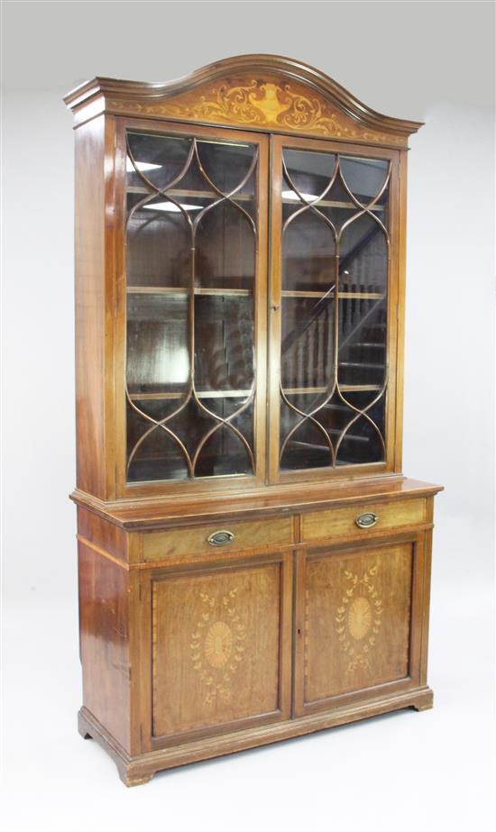 An Edwardian mahogany and satinwood inlaid bookcase, W.4ft H.7ft 6.5in.